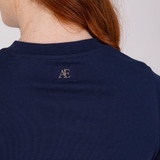 Navy blue sweatshirt with a logo on the chest against a neutral background