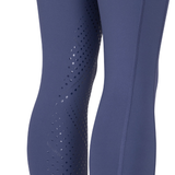 close up of inside of blue leggings on white background