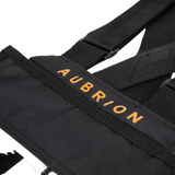 Black vest with 'Aubrion' branding on a white background