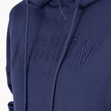 Close up of Blue 'Aubrion' embost print sweater