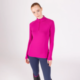 Woman wearing a bright pink long-sleeve top on a white background