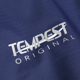 Close-up of a blue fabric with 'Tempest Original' text in white.
