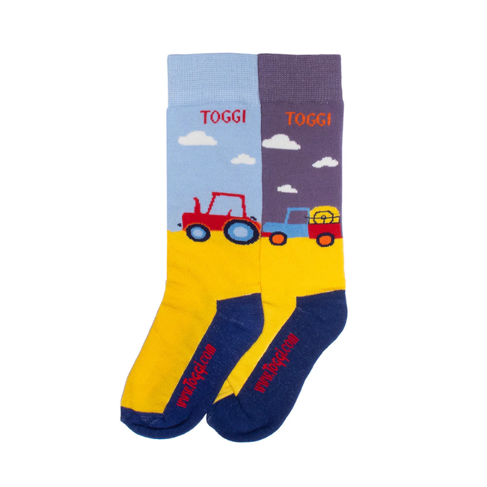 Colorful socks with vehicle designs and 'Toggi' branding on a white background